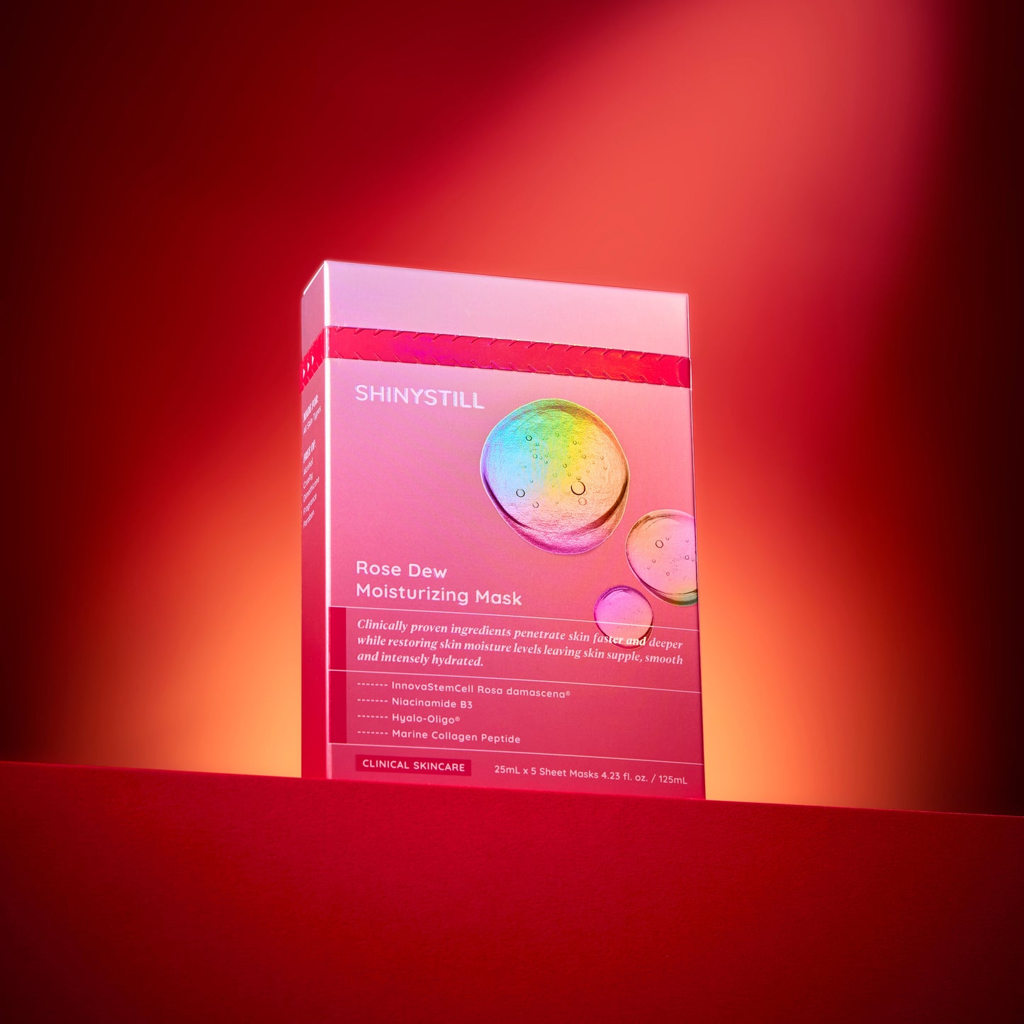 ShinyStill product packaging on a red background