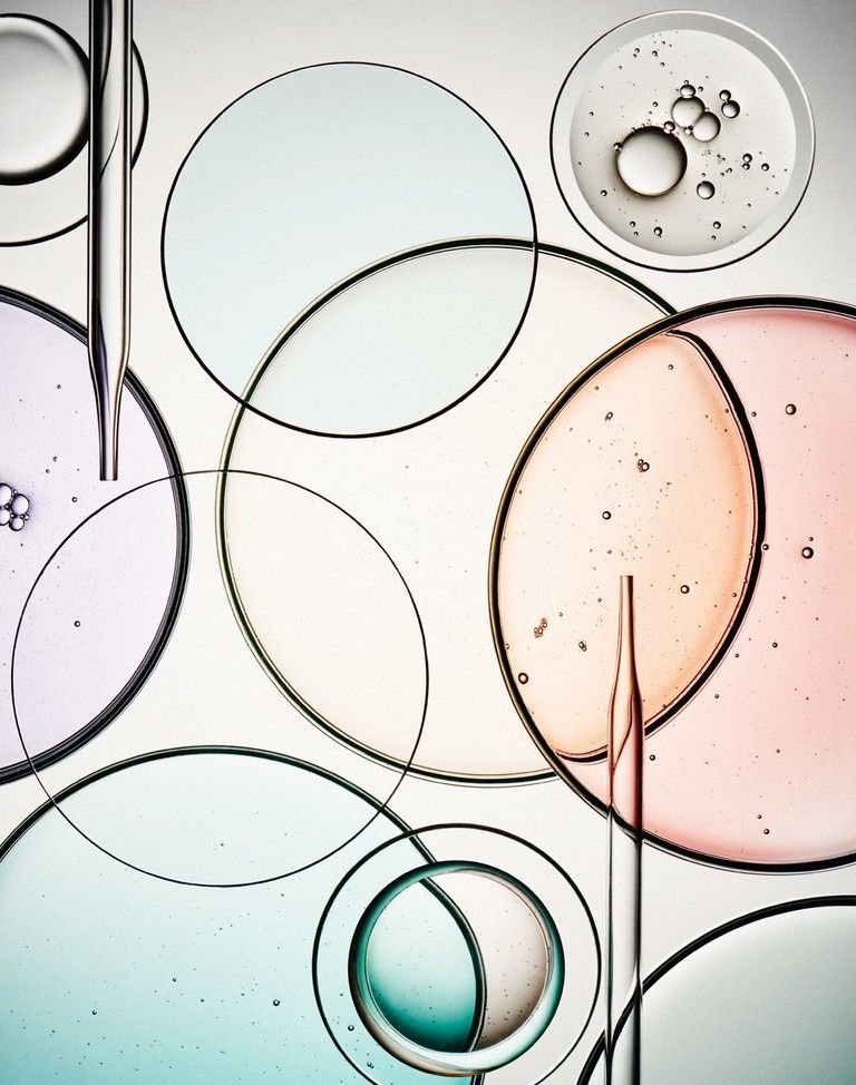 Colorful bubbles and circular shapes on a textured surface