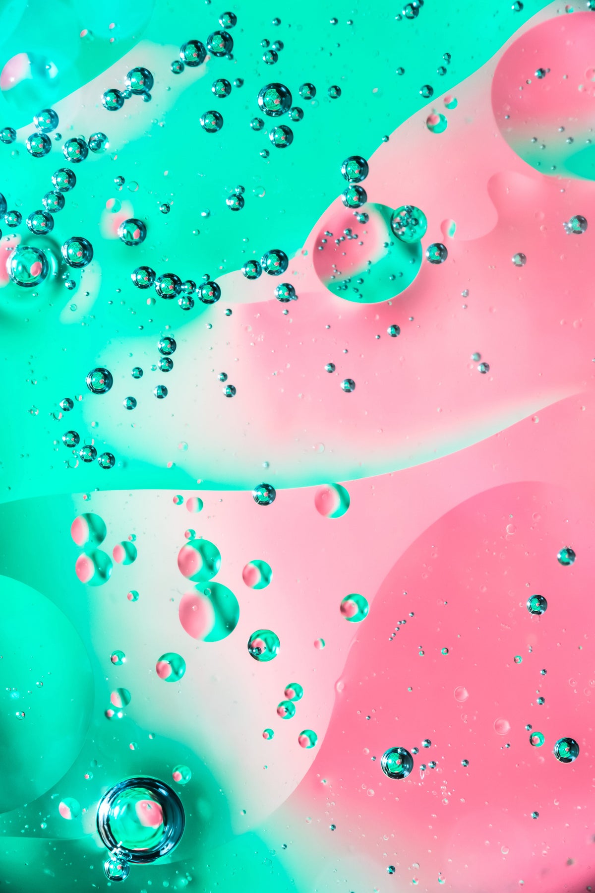 Colorful liquid with bubbles on a gradient background