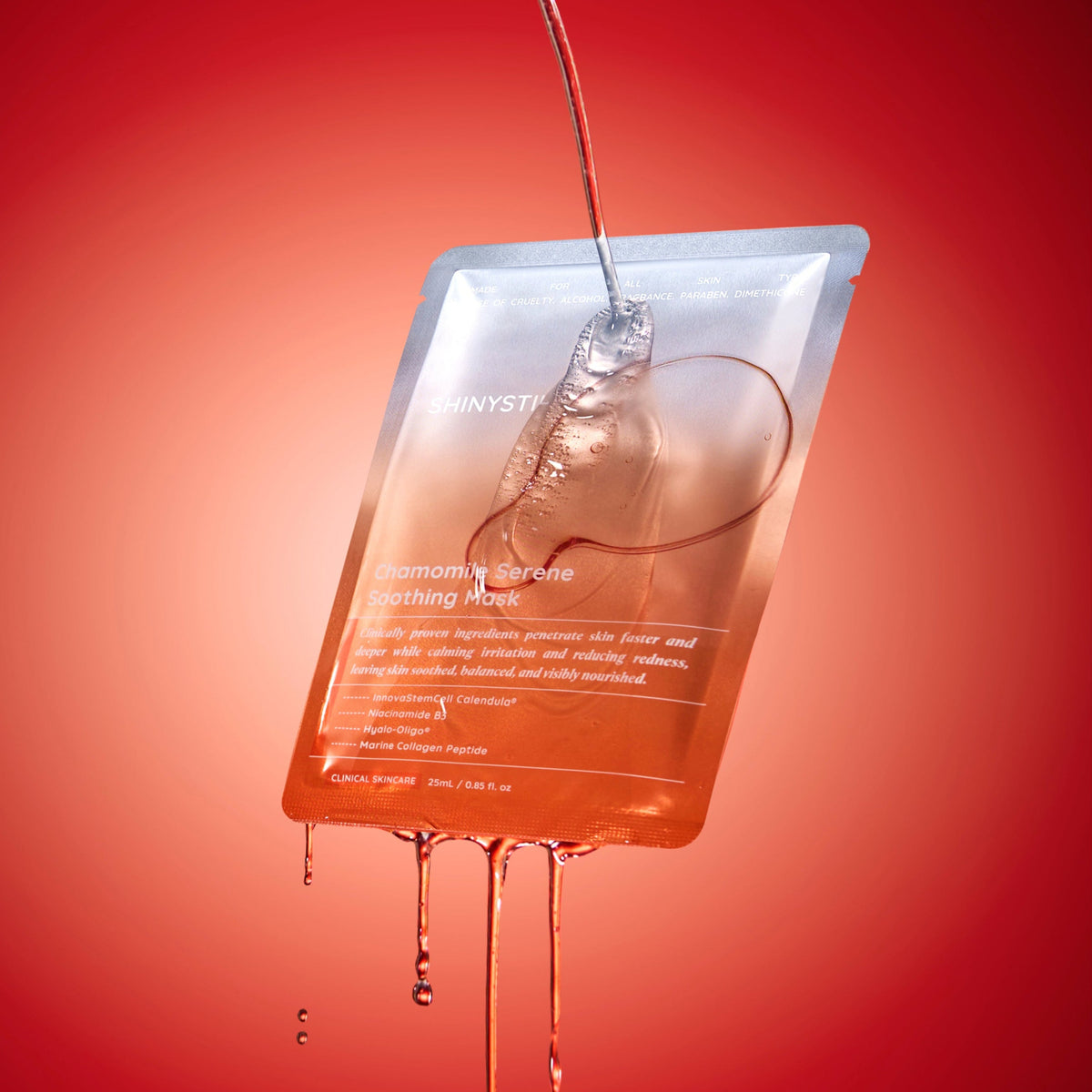 Skincare mask being poured onto a red background